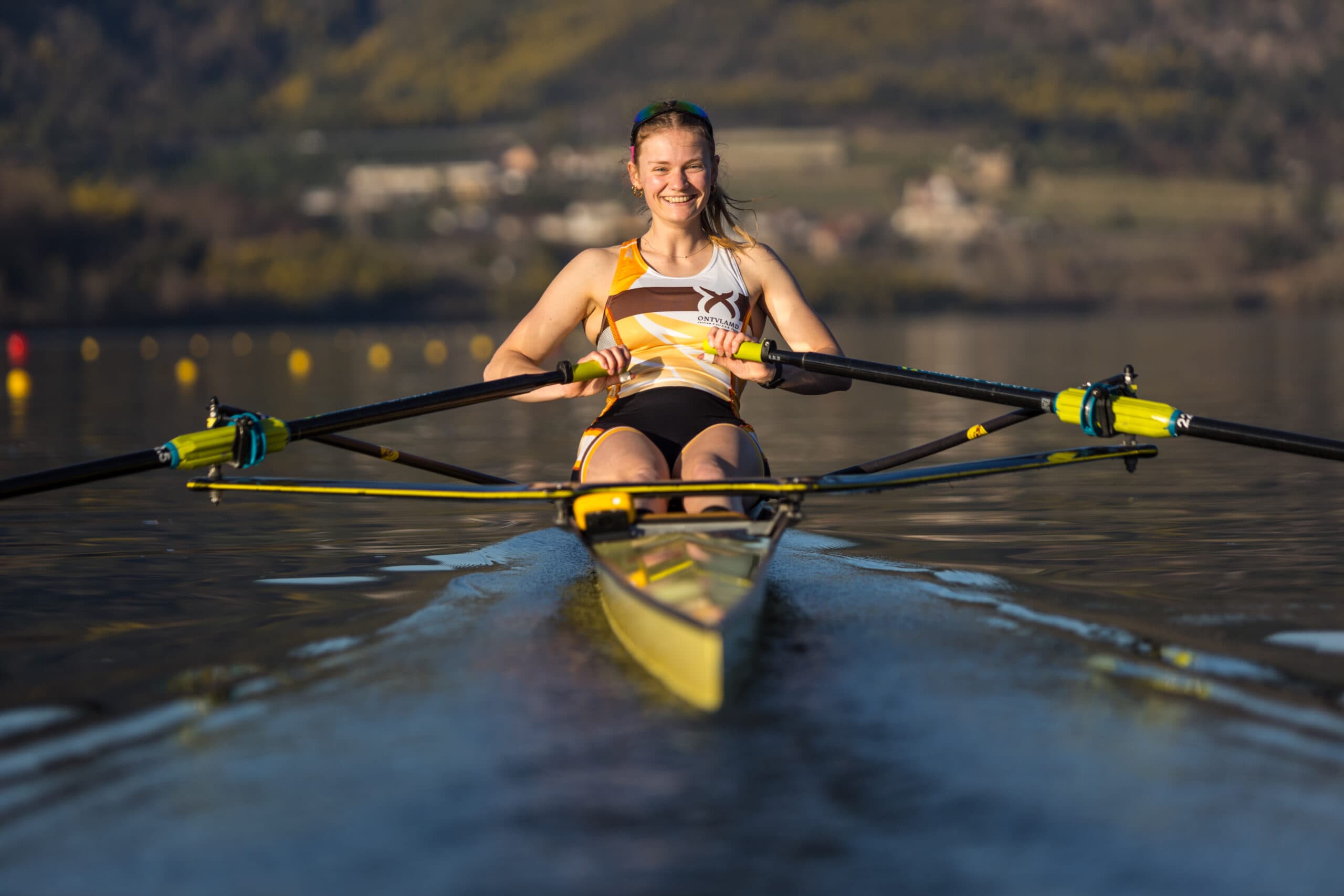 Single sculler training at golden hour